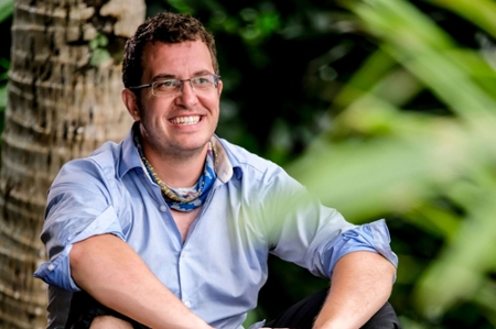 Rick Devens smiling, seated outdoors, from Survivor: Edge of Extinction