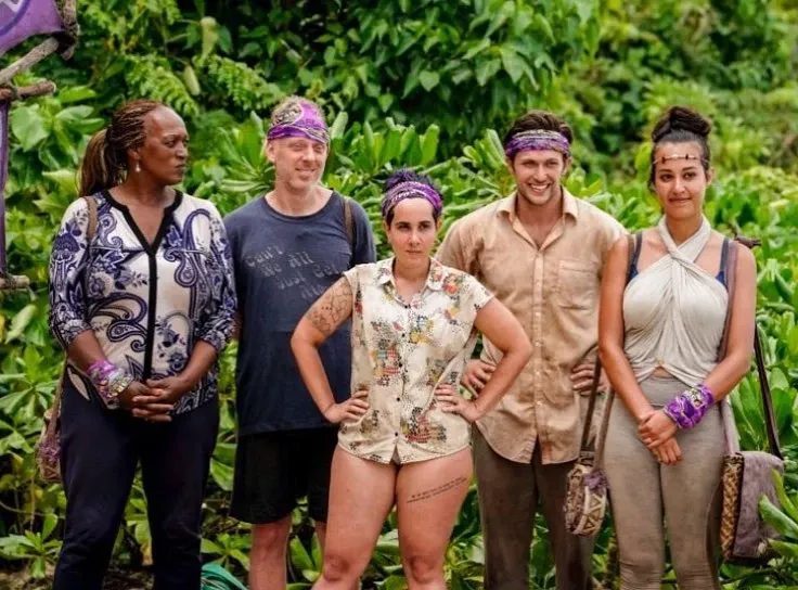 Members of the Jabeni tribe standing in the jungle in Survivor: David vs. Goliath