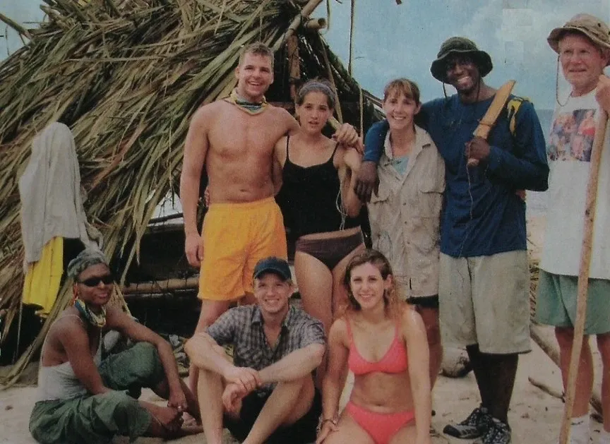 Members of the Pagong tribe outside their shelter in Survivor: Borneo