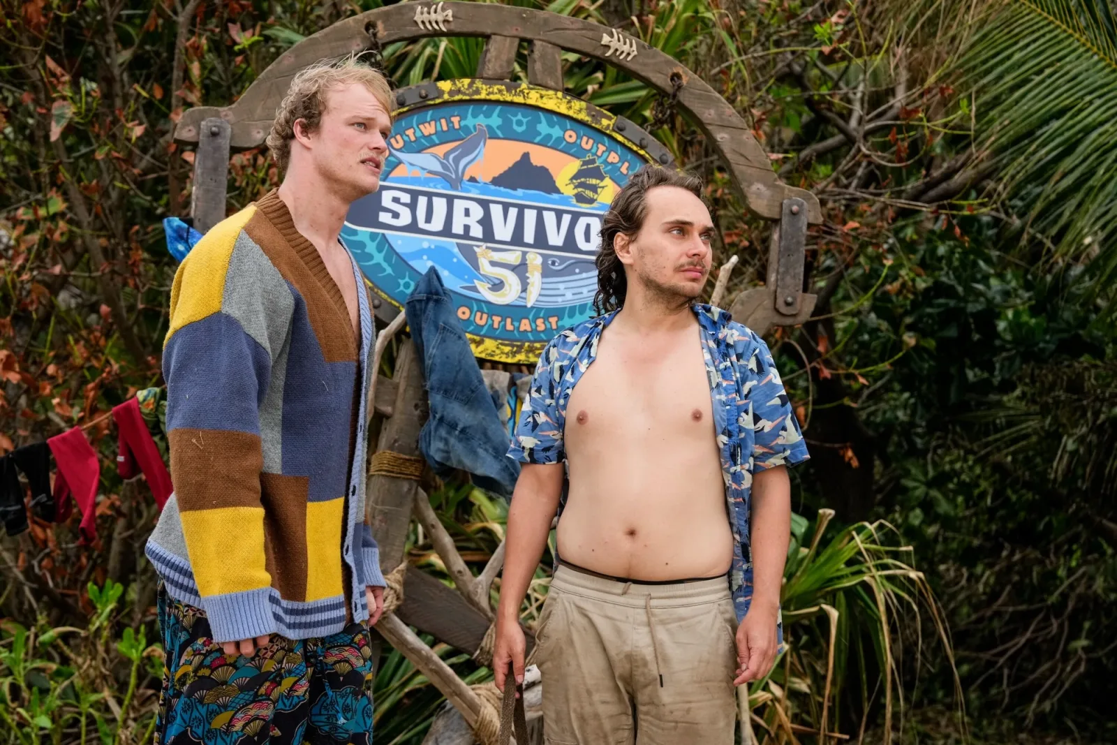 Brady Booker and Danny "Kilby" Kilby standing by the Survivor 51 sign